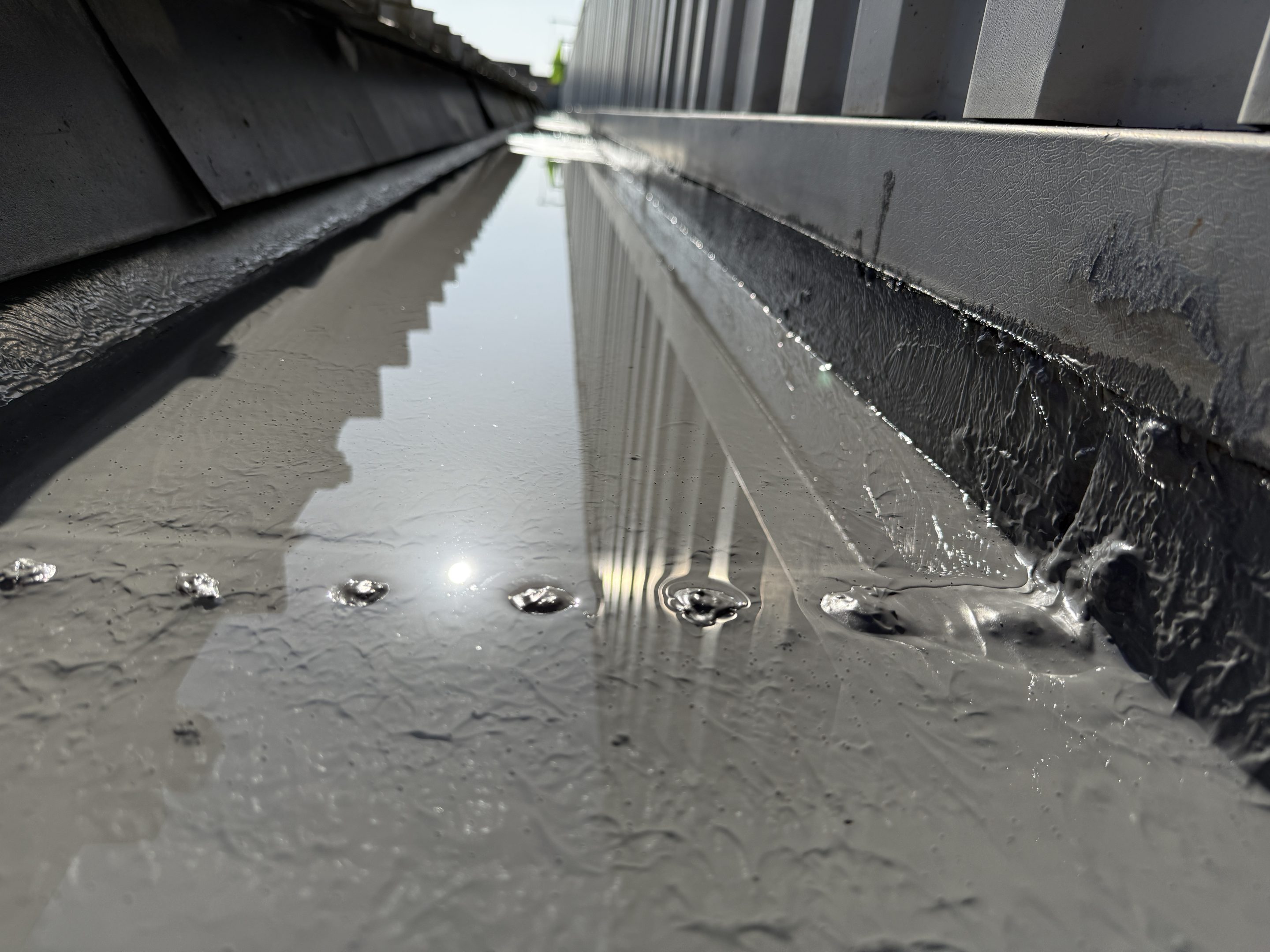 Image showing Liquasil's liquid gutter lining system, Gutterseal.