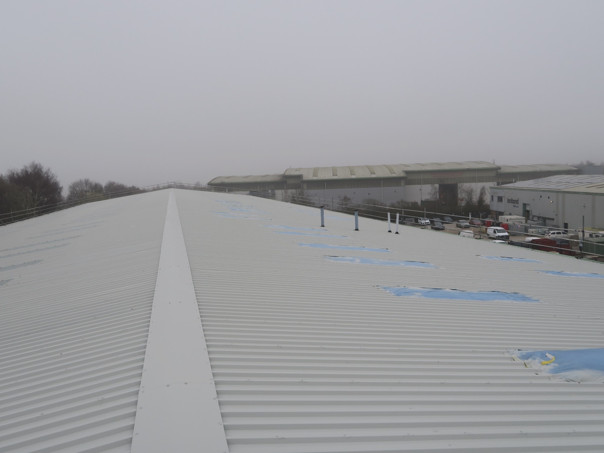 image showing: The completed roof following localised sheet-end repairs and application of the Metalseal 20 coating system.