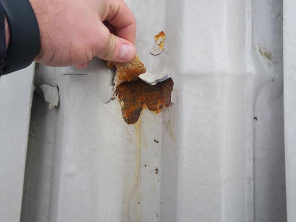 Image showing incorrect surface preparation and coating over rust