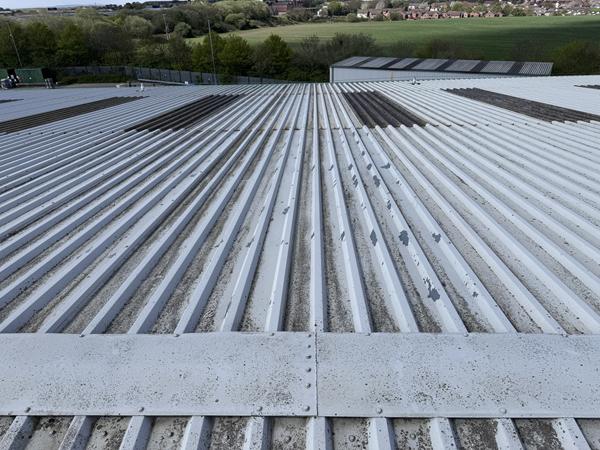 image showing delamination of plastisol finish in isolated areas on a steel profiled roof