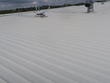 Metal Roof Refurbishment With Sealed Mid-Laps