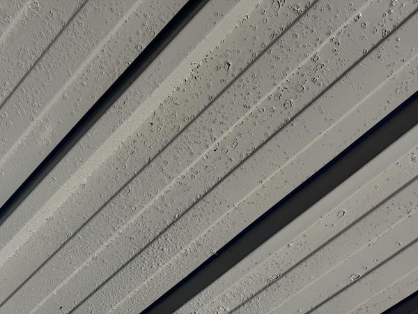 image demonstrating the affect of rainfall during application of a silicone roof coating<br />