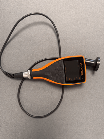 An image showing an Elcometer dry film weight gauge